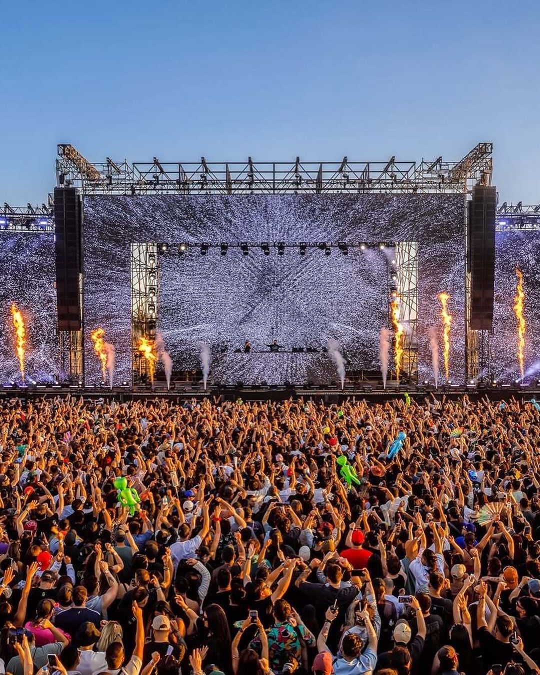 A crowd gathered at an outdoor live event